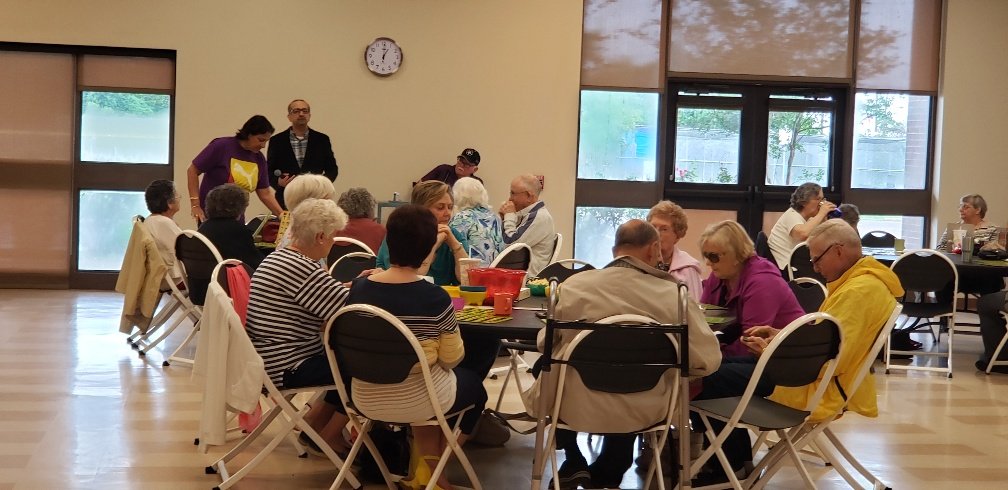 Seniors gathering at a community event